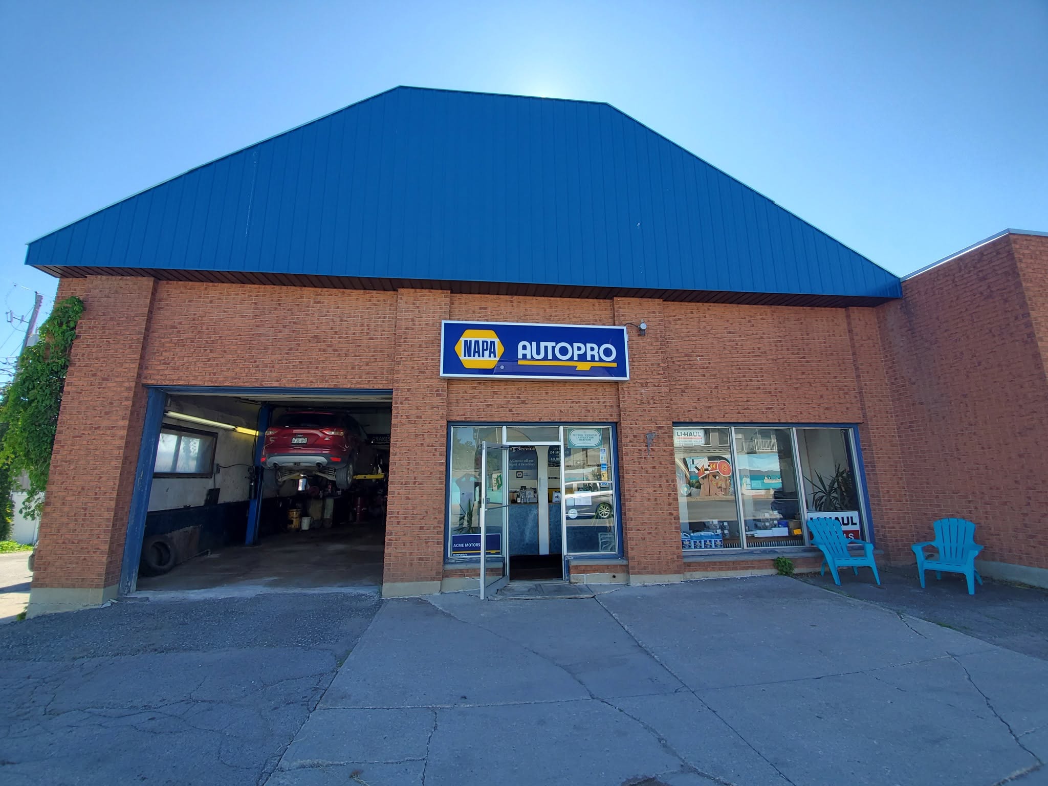 The Acme Motors shop today at 12 Worthington St, Little Current, with the NAPA AUTOPRO sign